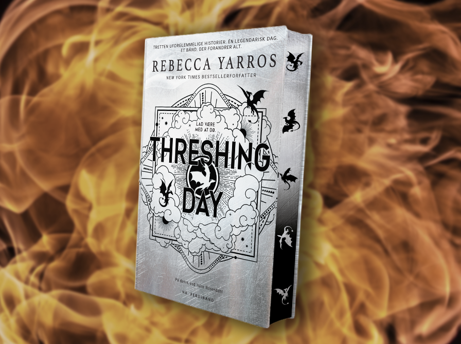 Bogen "Threshing Day" ses på en baggrund af ild.